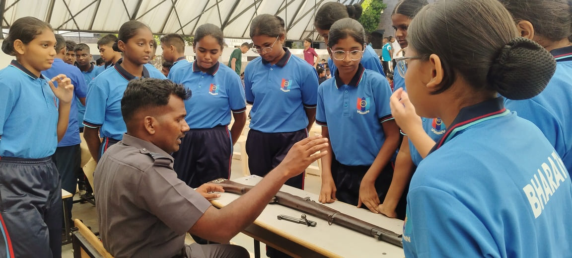 Cadets learning weapon handling during training