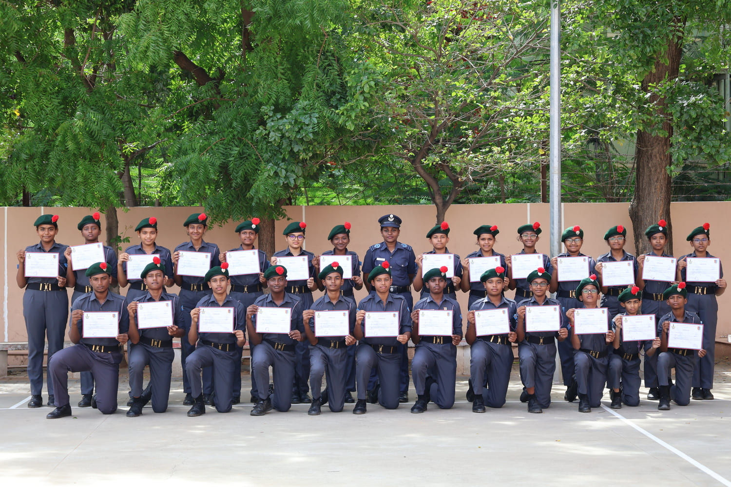 Cadets displaying their camp certificates